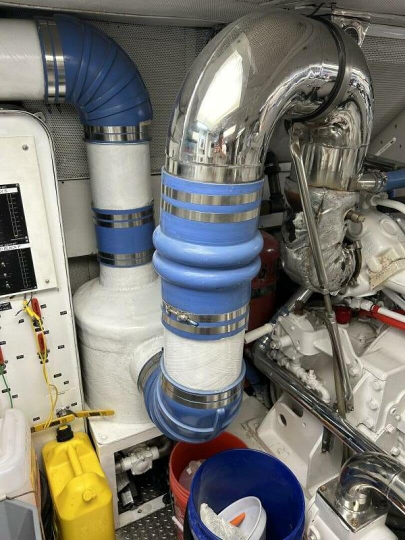 a machine with a large metal cylinder aboard TOTO Yacht for Sale