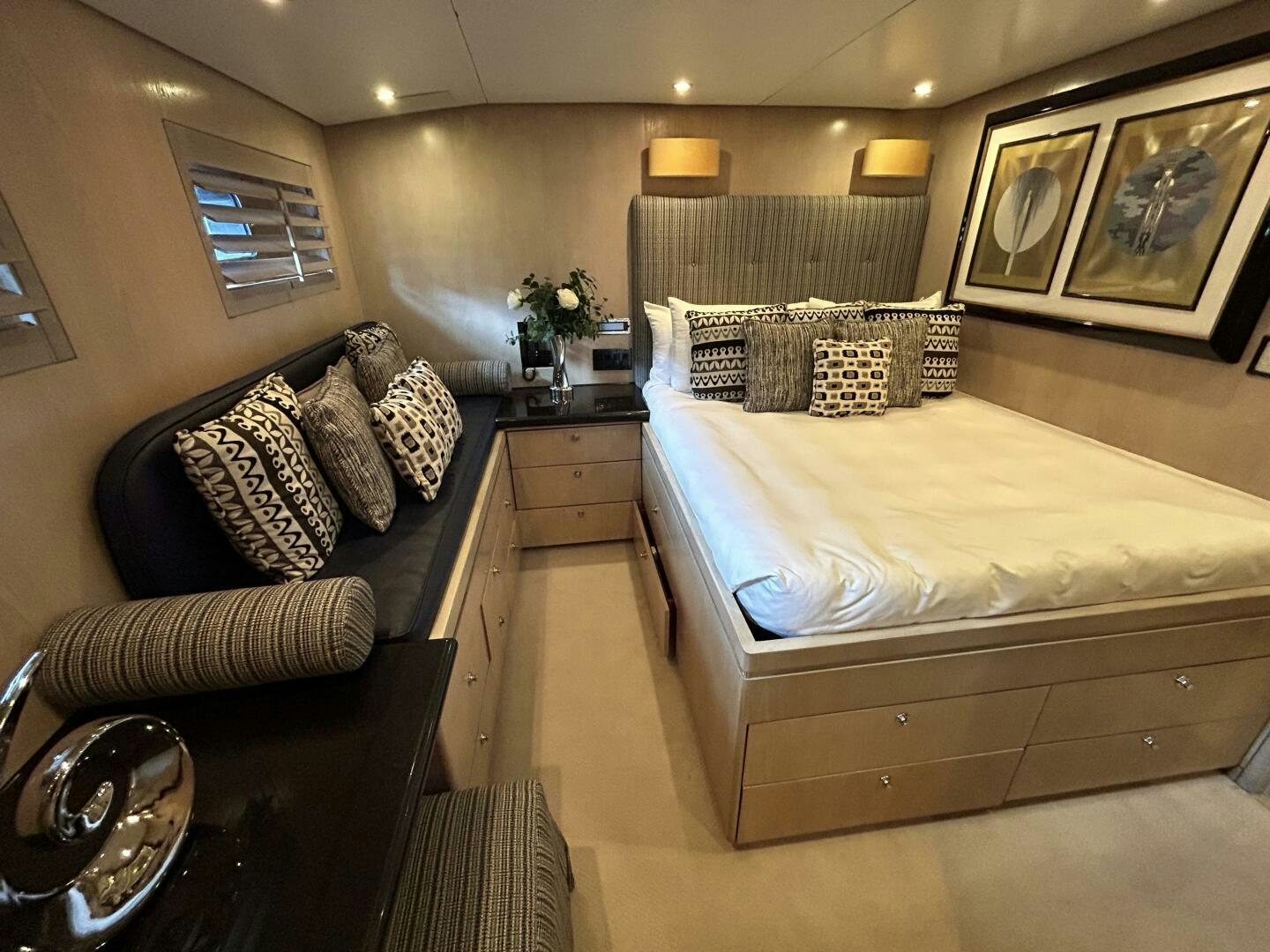 a room with a bed and a couch aboard TOTO Yacht for Sale