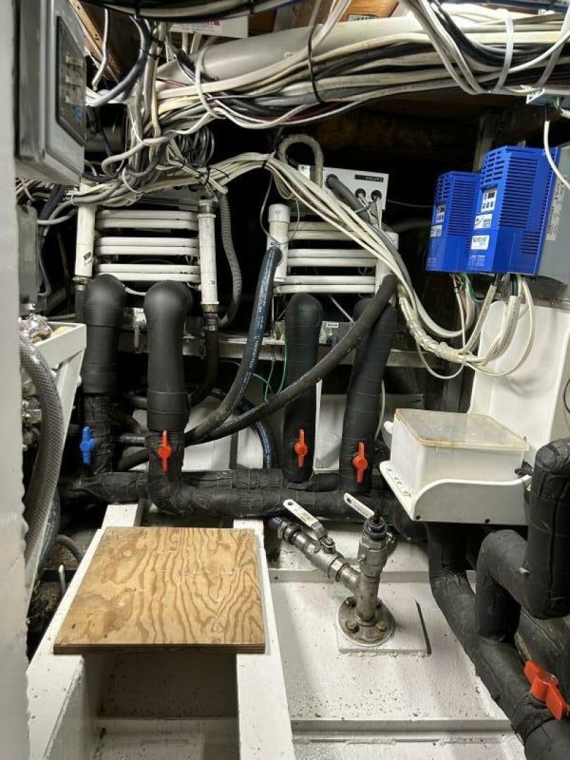 a machine with wires and a wooden board aboard TOTO Yacht for Sale
