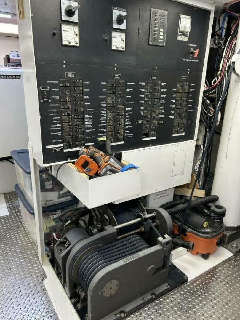 a machine with a piece of equipment aboard TOTO Yacht for Sale