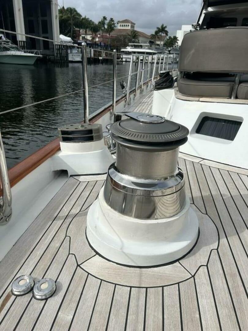 a water fountain on a dock aboard TOTO Yacht for Sale