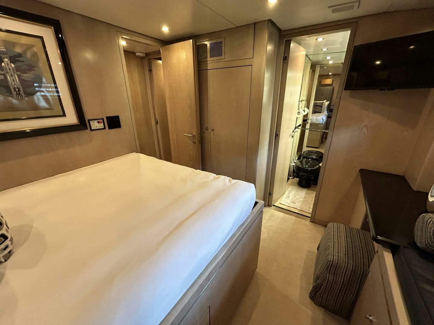a hotel room with a bed aboard TOTO Yacht for Sale