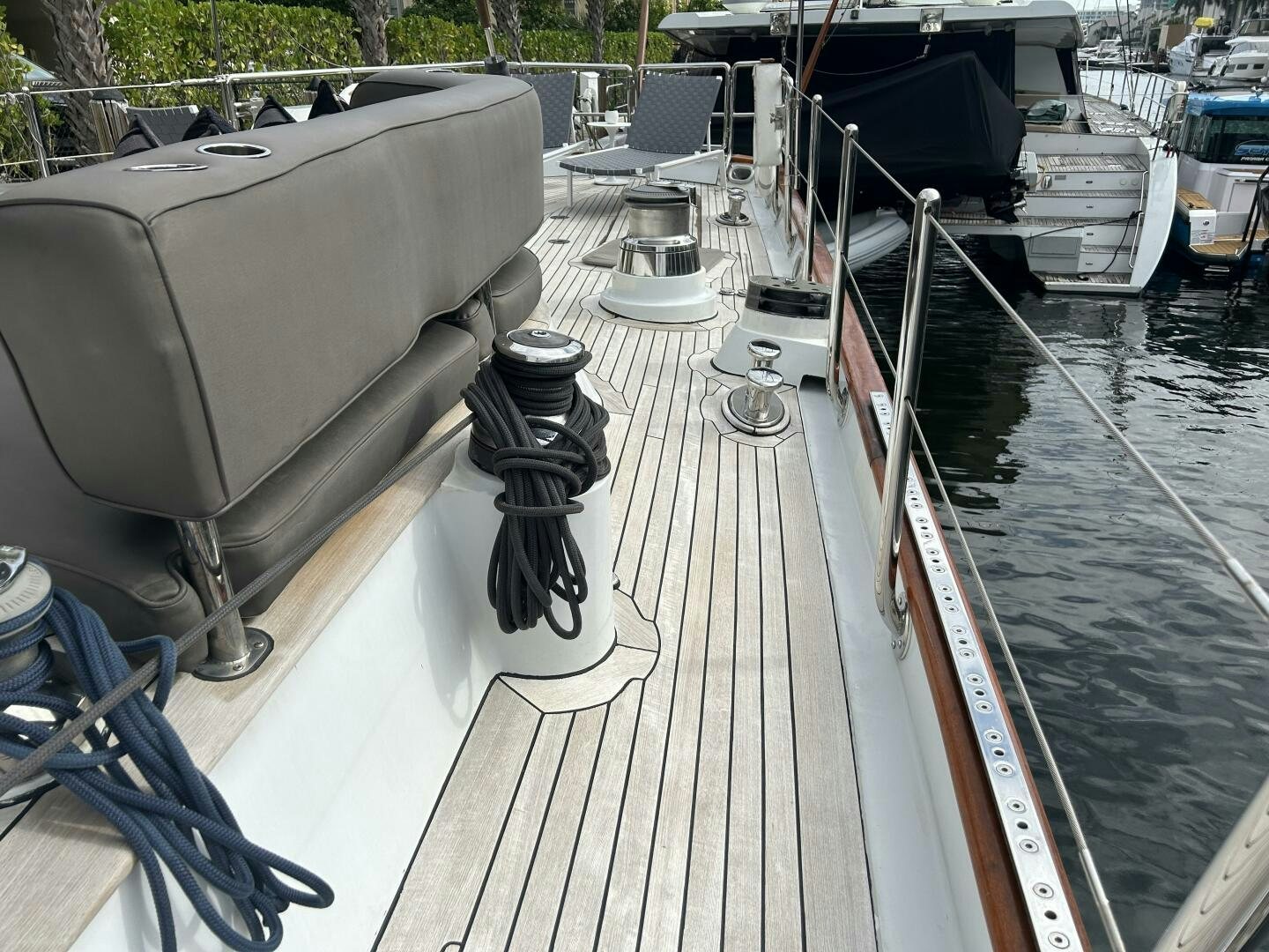 a deck with a large boat on it aboard TOTO Yacht for Sale