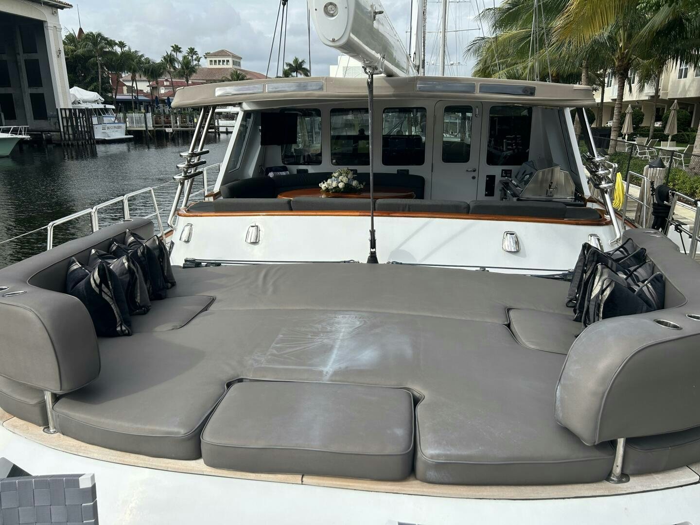 a white bus with a black seat aboard TOTO Yacht for Sale