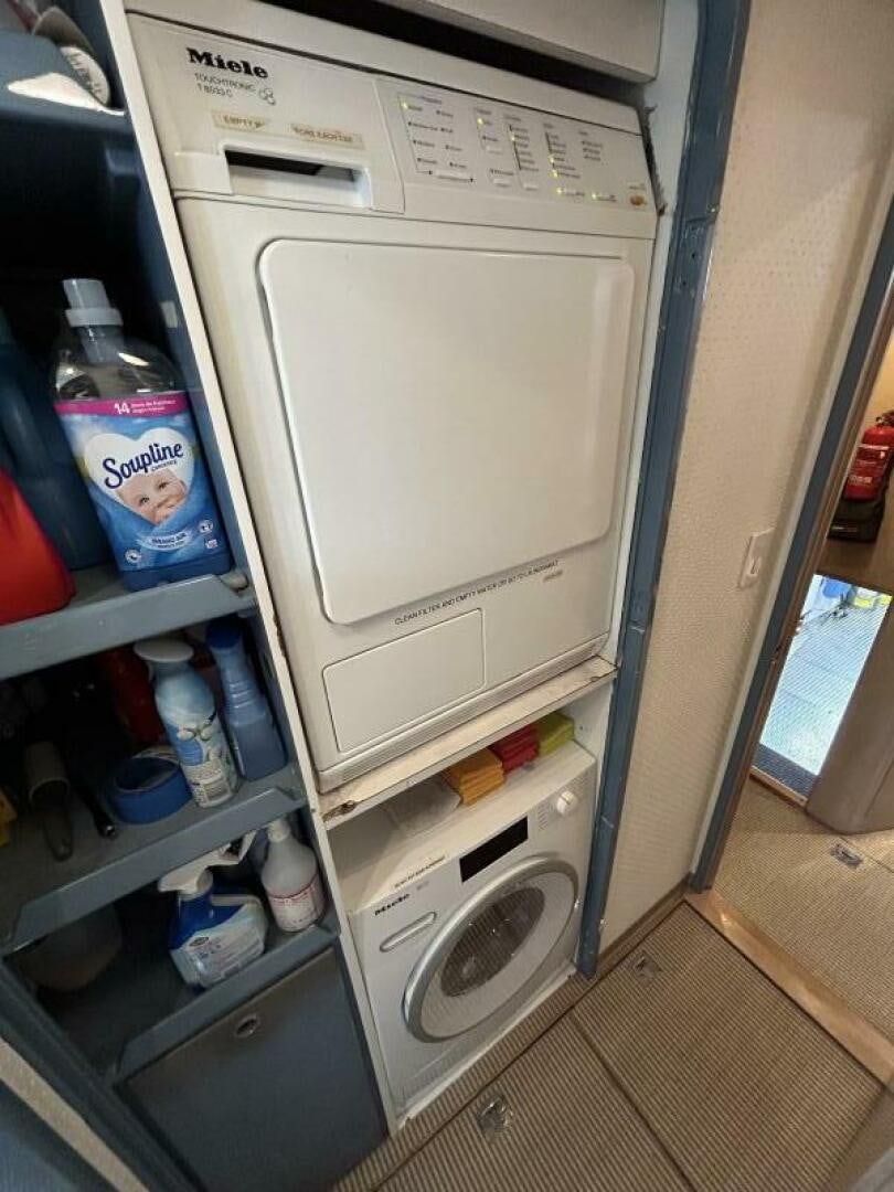a refrigerator with a door open aboard TOTO Yacht for Sale