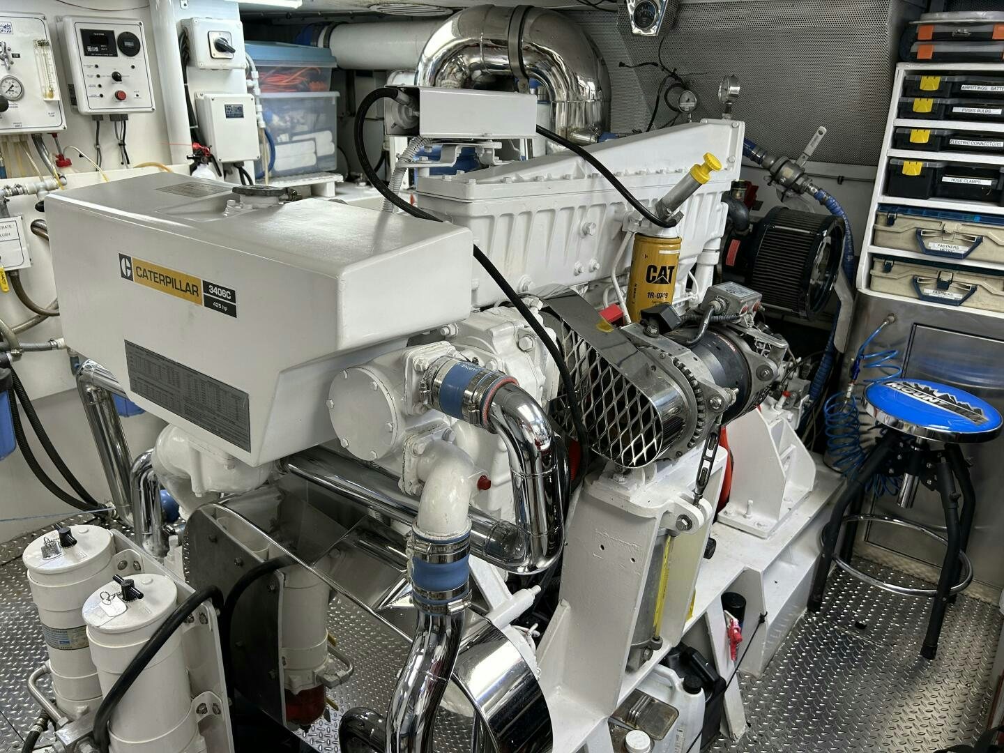 a machine with a large piece of equipment in it aboard TOTO Yacht for Sale