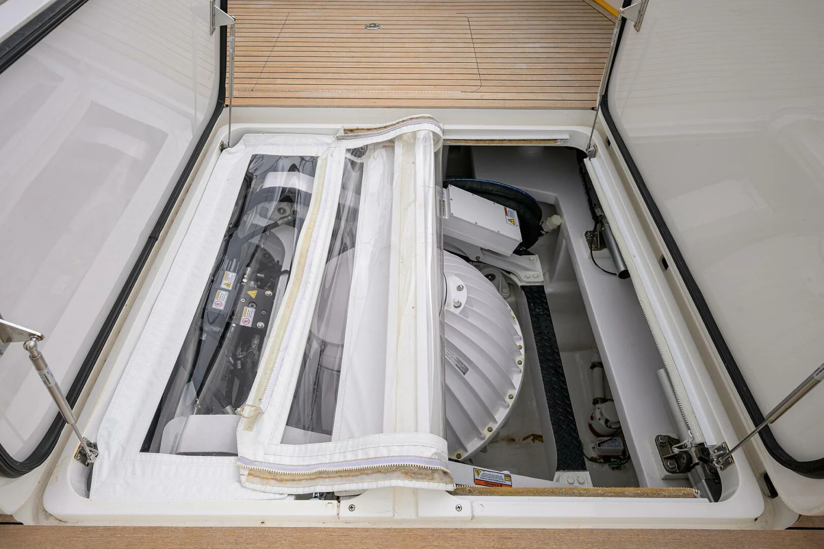 a white car with a broken window aboard TAMI ANN Yacht for Sale