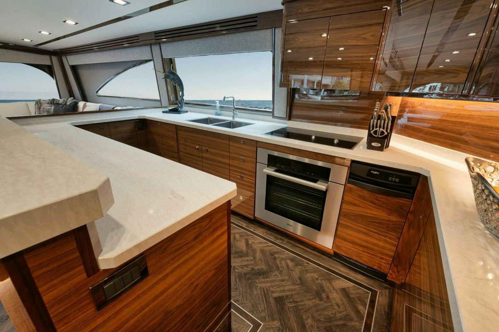 a kitchen with a large island aboard LUCKY DICK Yacht for Sale