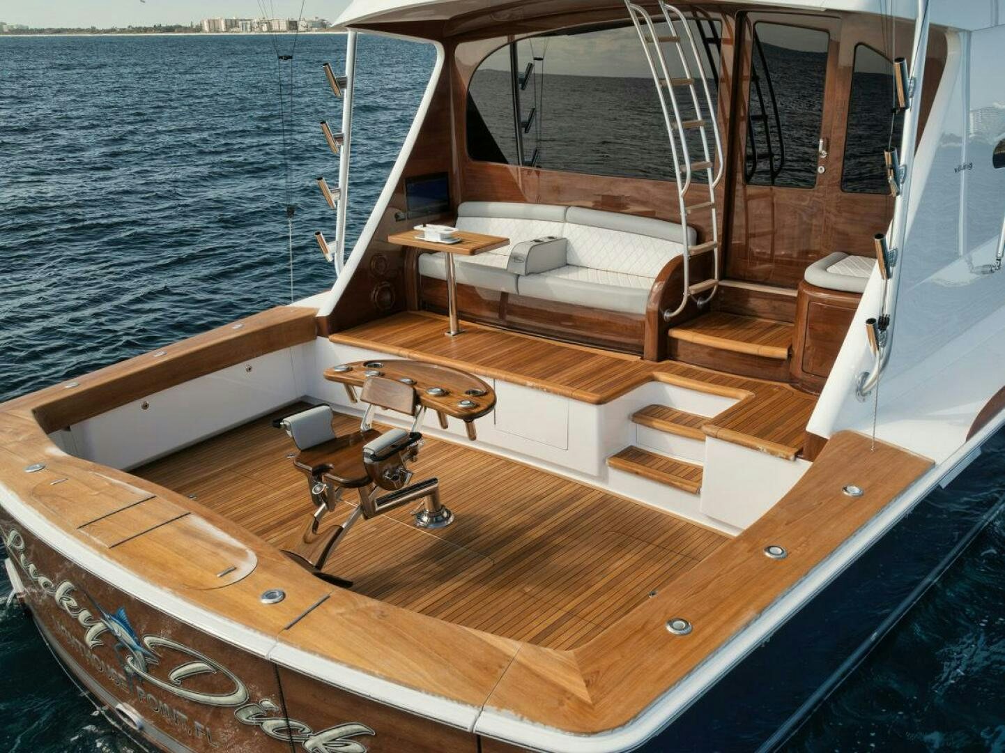 a boat with a bench and a table on it aboard LUCKY DICK Yacht for Sale