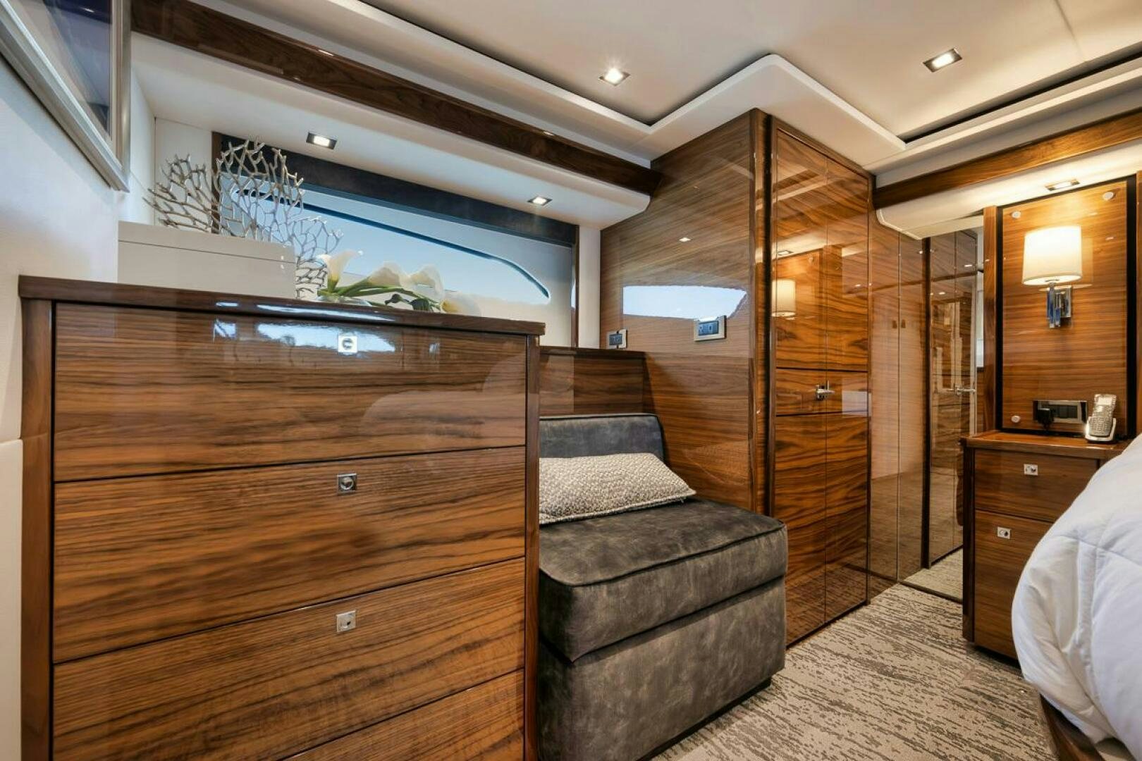 a living room with a couch and a tv aboard LUCKY DICK Yacht for Sale