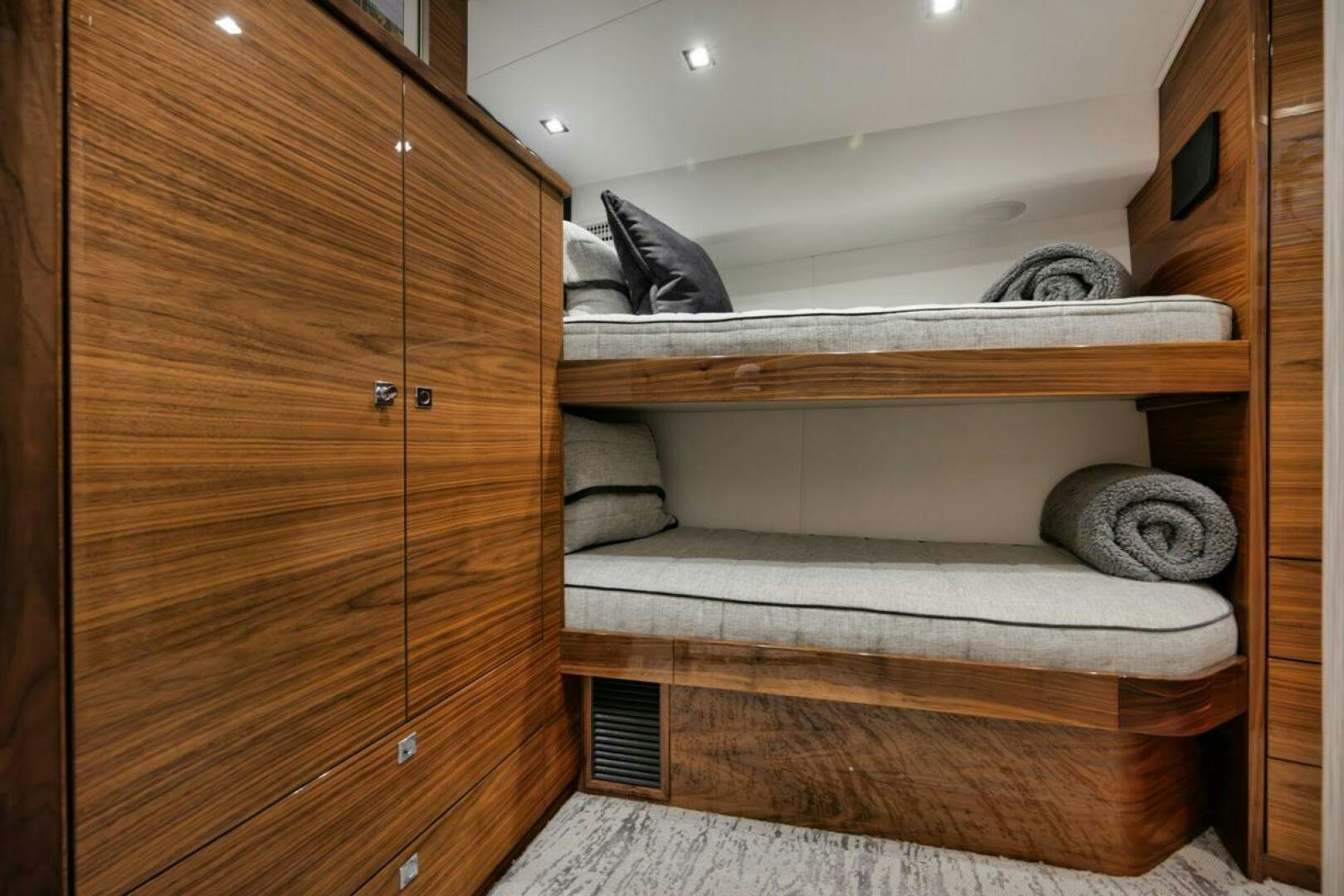 a closet with a bed aboard LUCKY DICK Yacht for Sale