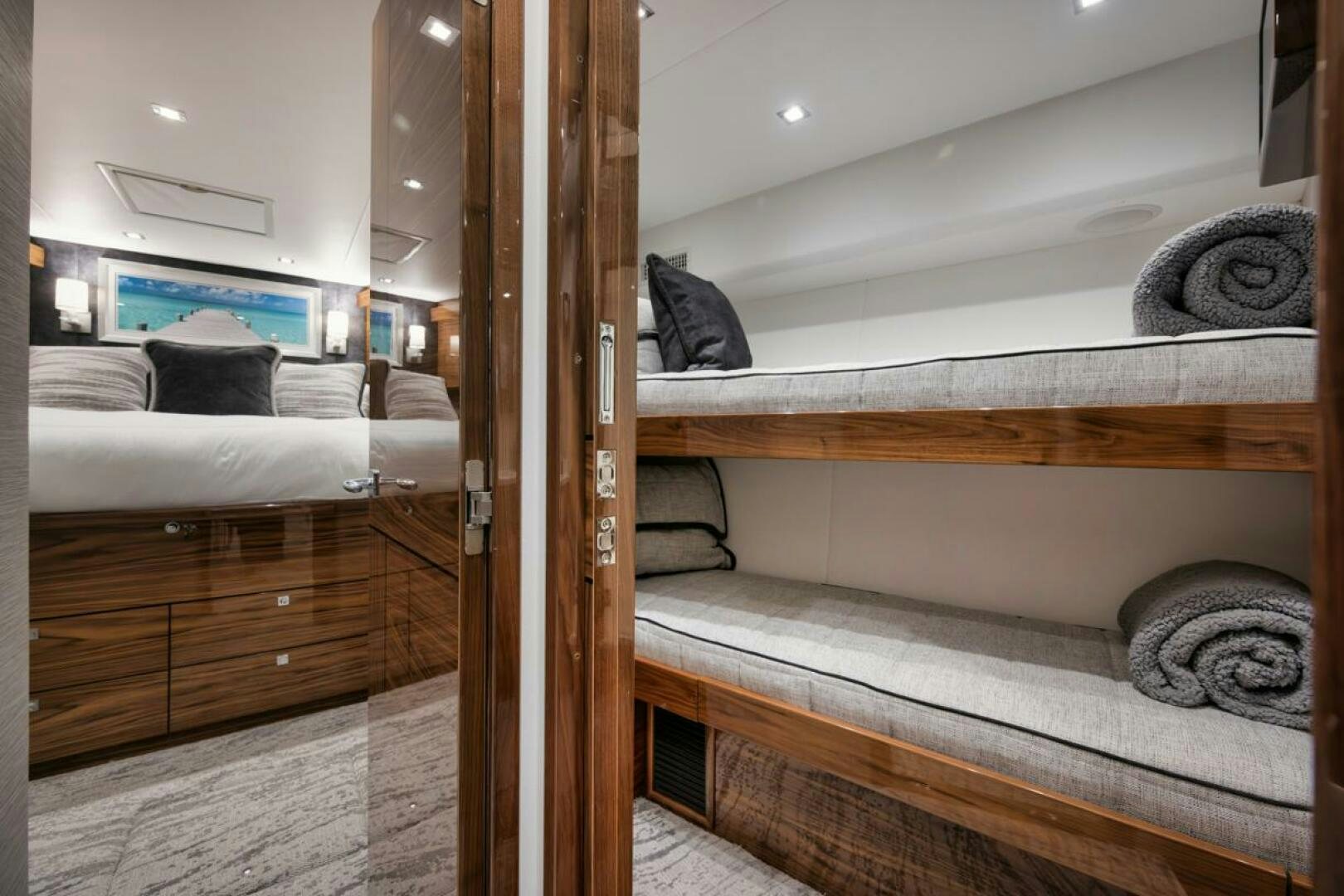 a bed with a wood frame aboard LUCKY DICK Yacht for Sale