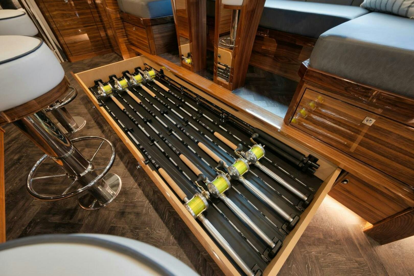 a black and silver piano aboard LUCKY DICK Yacht for Sale