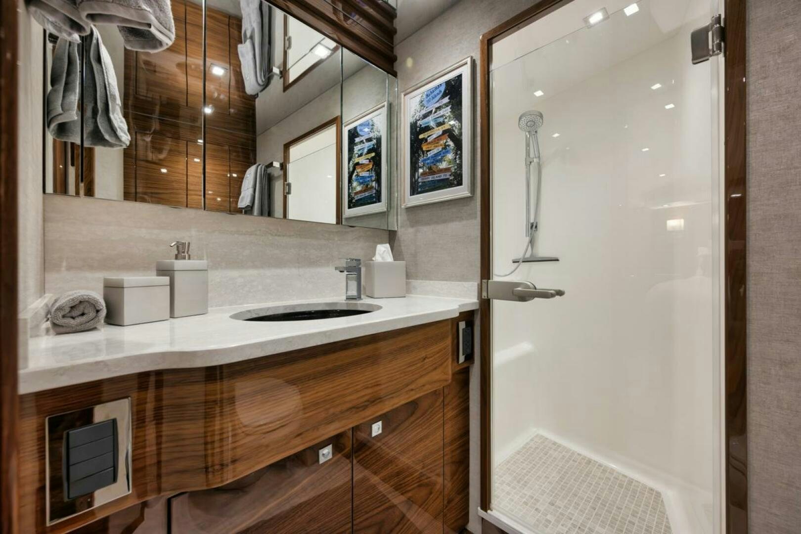 a bathroom with a sink and a mirror aboard LUCKY DICK Yacht for Sale
