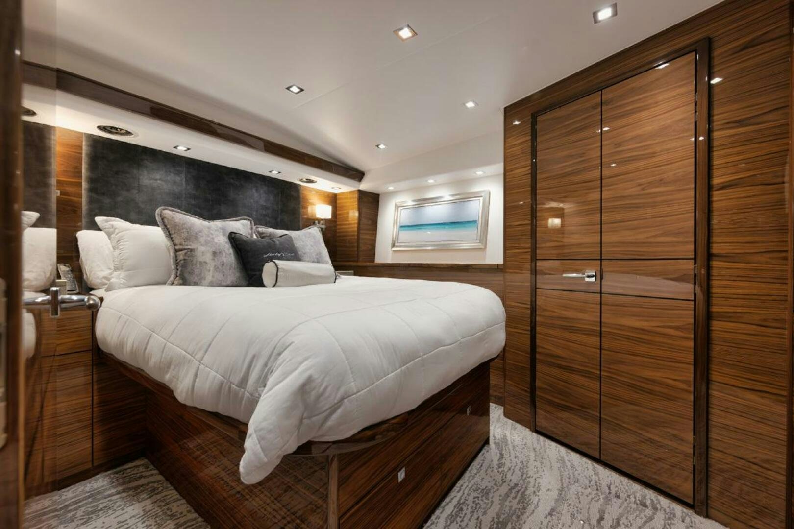 a bed in a room aboard LUCKY DICK Yacht for Sale