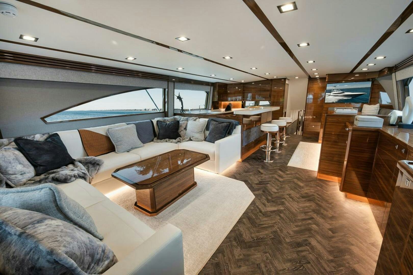 a living room with a large window aboard LUCKY DICK Yacht for Sale
