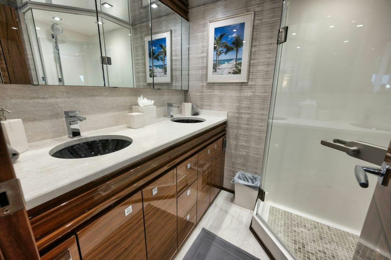 a bathroom with a sink and a shower aboard LUCKY DICK Yacht for Sale
