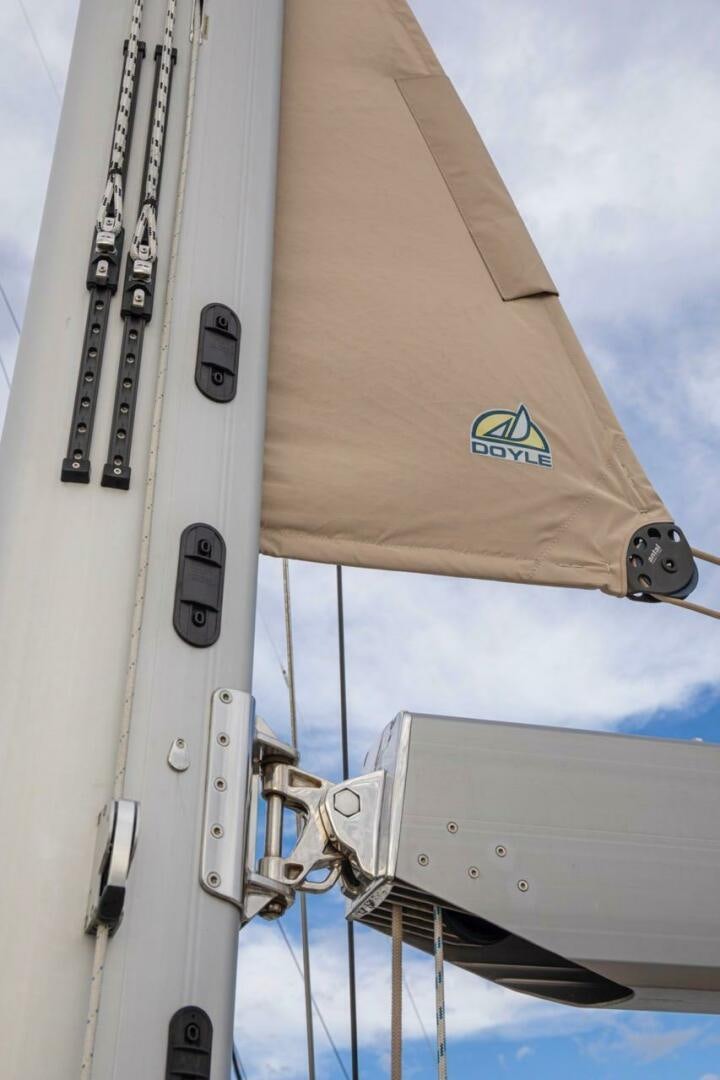 a sailboat with a white sail aboard INDEPEPDENCE Yacht for Sale