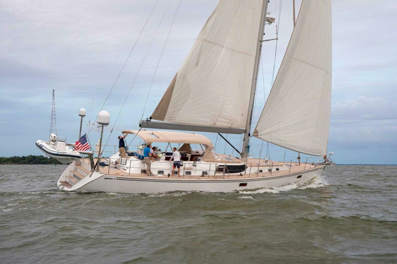 a group of people on a sailboat aboard INDEPEPDENCE Yacht for Sale