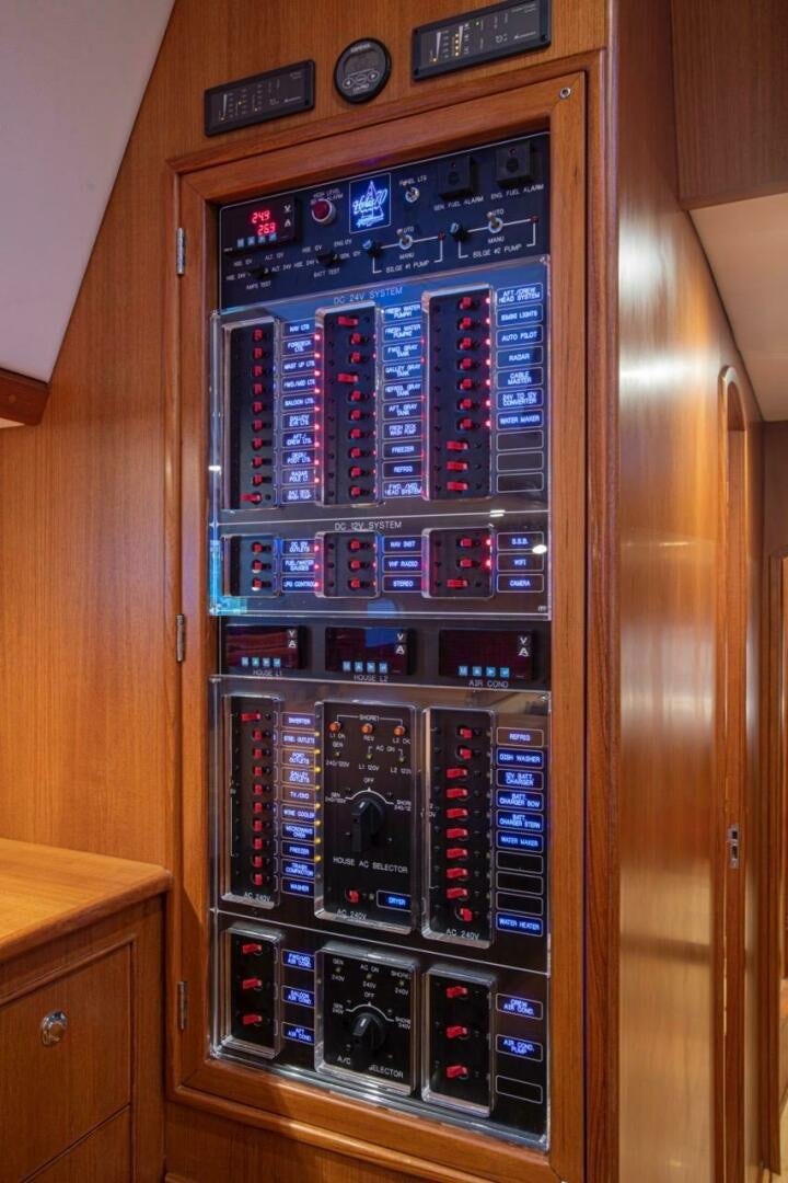 a computer tower with many buttons aboard INDEPEPDENCE Yacht for Sale