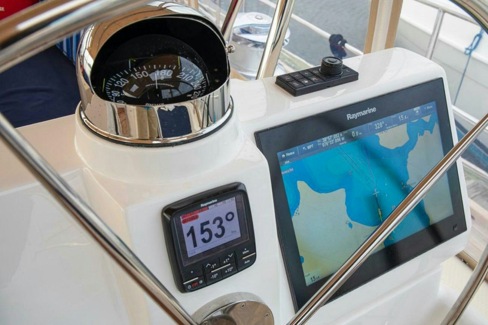 a gas pump with a sign aboard INDEPEPDENCE Yacht for Sale