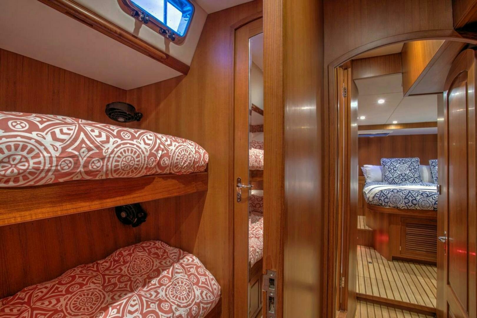 a bed in a room aboard INDEPEPDENCE Yacht for Sale
