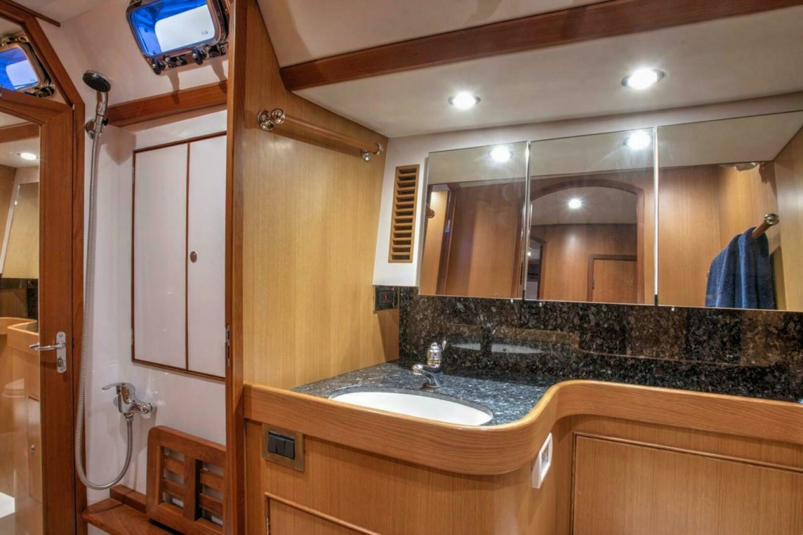 a bathroom with a large countertop aboard INDEPEPDENCE Yacht for Sale