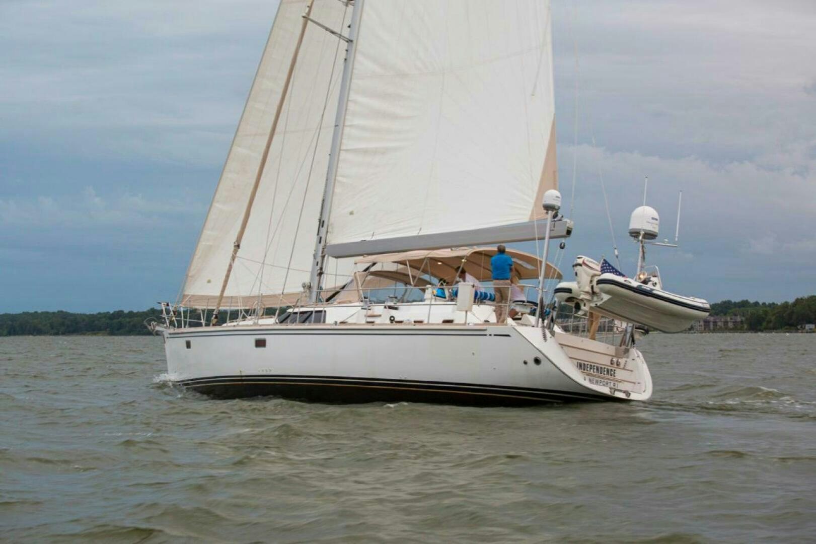 a boat on the water aboard INDEPEPDENCE Yacht for Sale