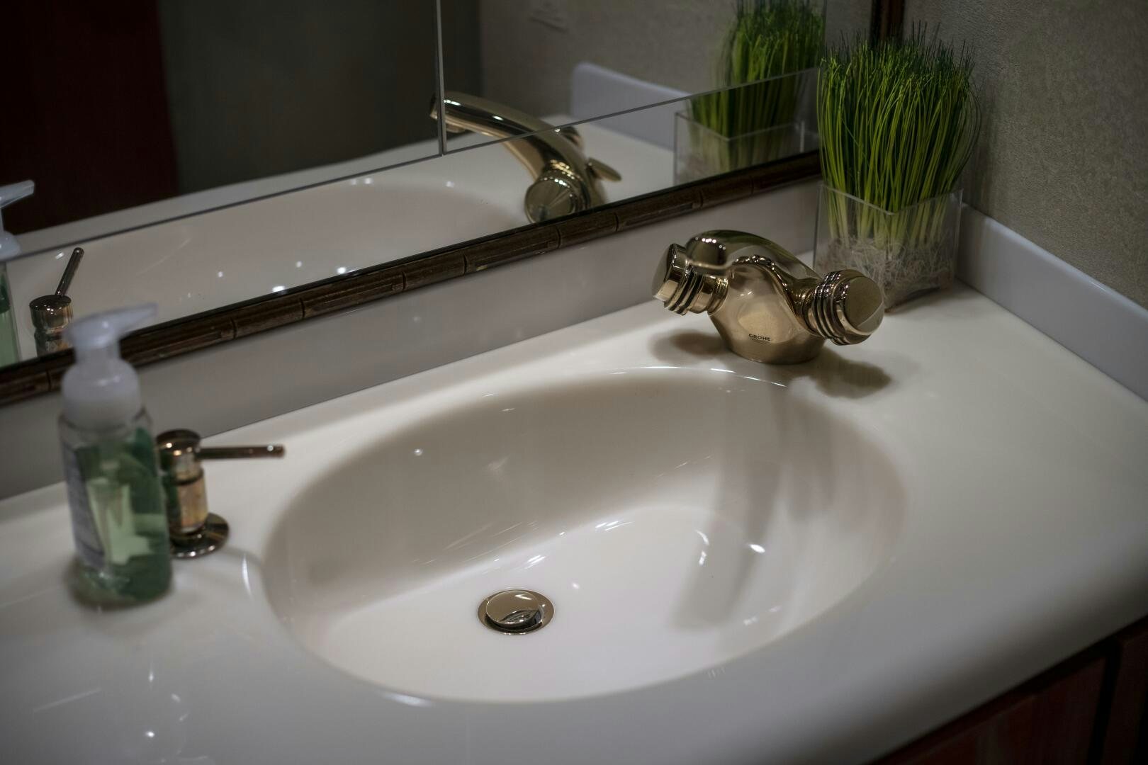 a bathroom sink with a faucet aboard PRIME TIME Yacht for Sale