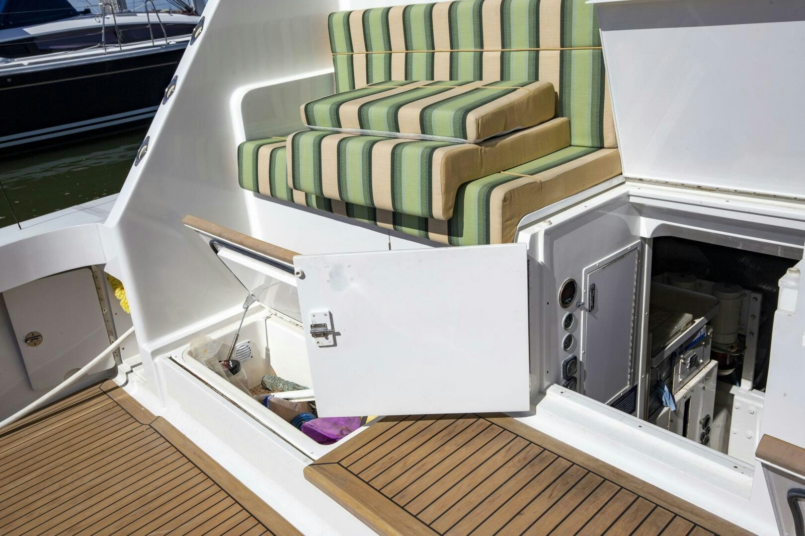 a room with a couch and a table aboard PRIME TIME Yacht for Sale
