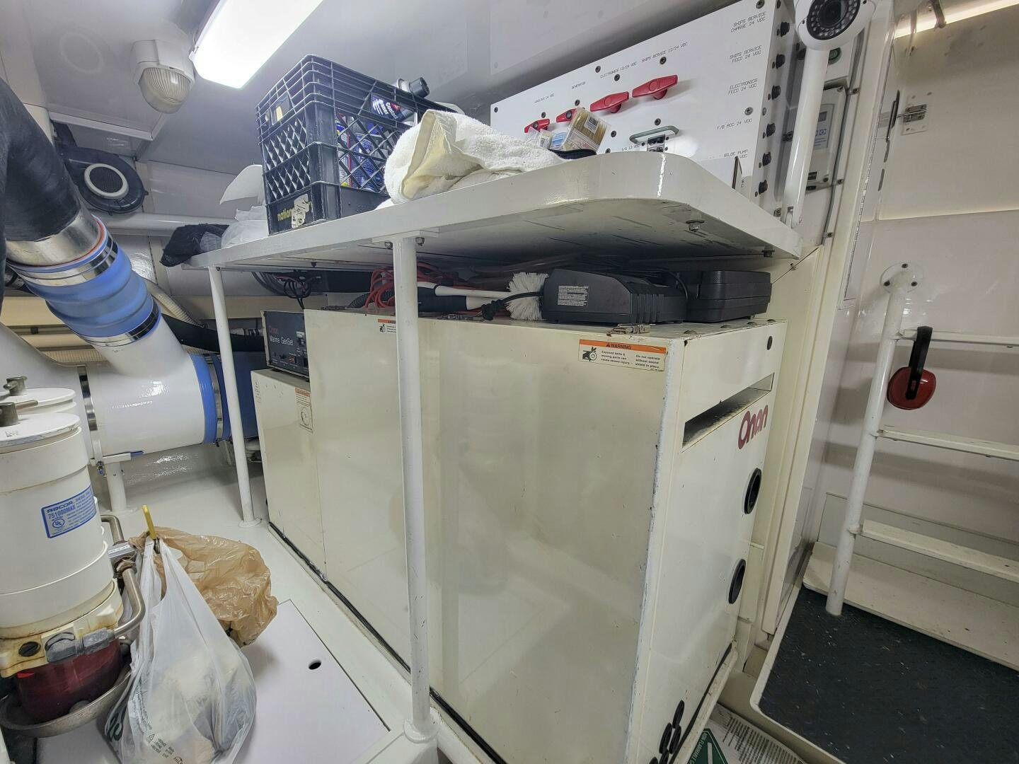 a white machine with a white object in it aboard PRIME TIME Yacht for Sale