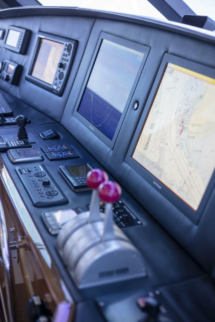 a pink rose on a machine aboard PRIME TIME Yacht for Sale