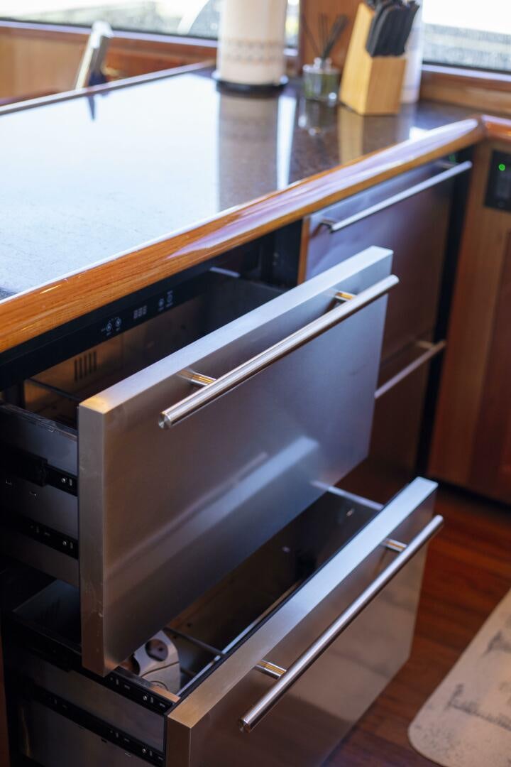 a metal cabinet with a drawer aboard PRIME TIME Yacht for Sale