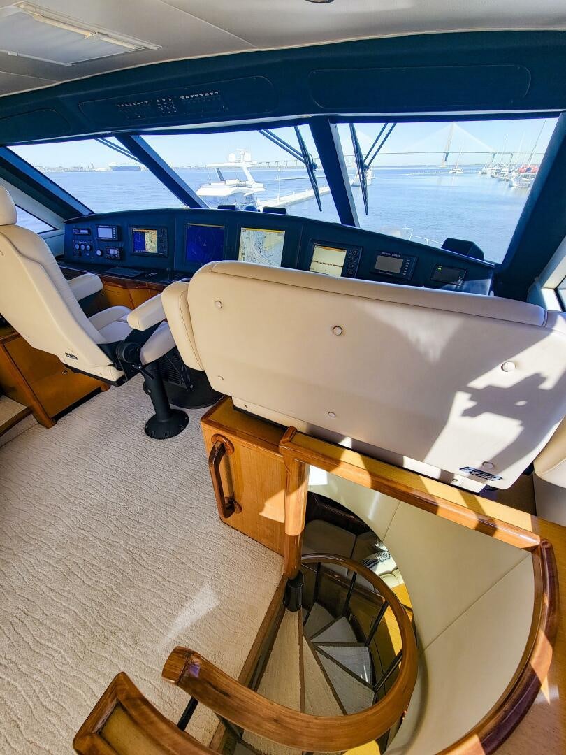 a wooden boat on a boat aboard PRIME TIME Yacht for Sale