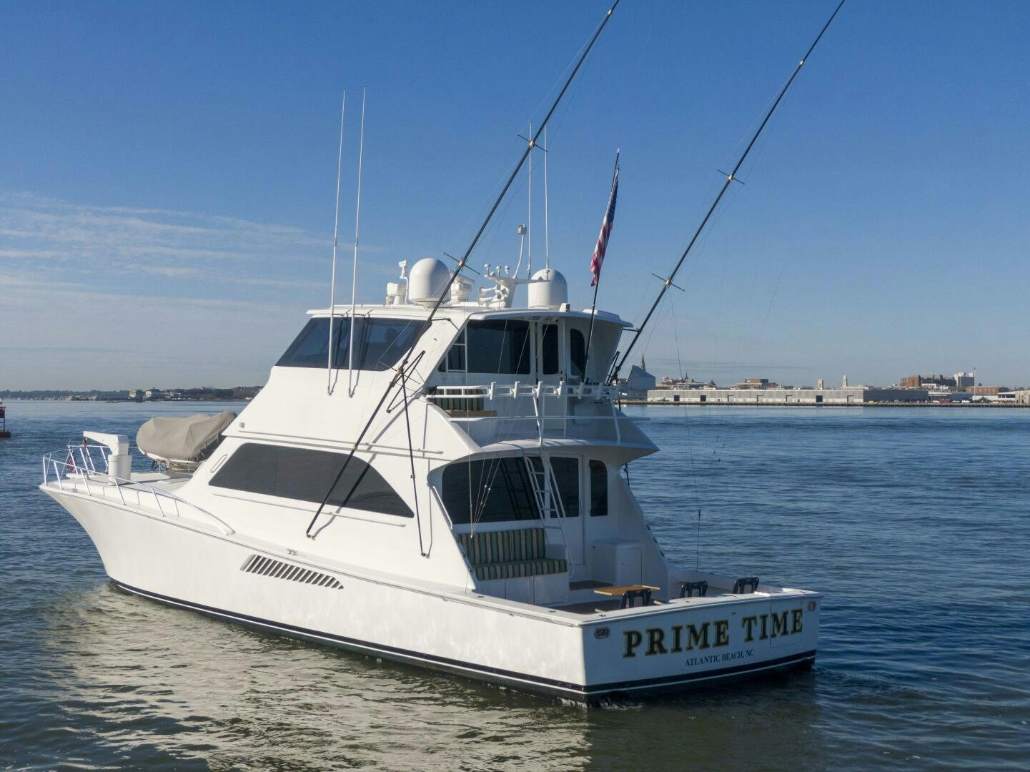 a white boat in the water aboard PRIME TIME Yacht for Sale