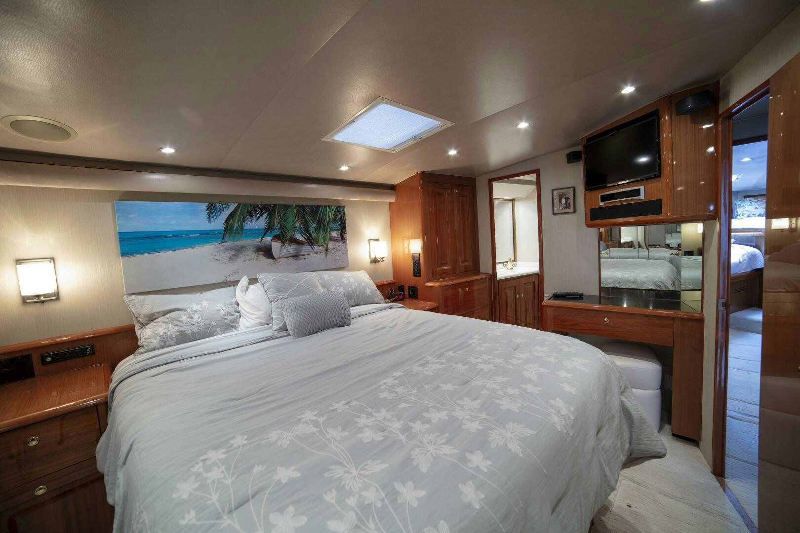 a large bed in a room aboard PRIME TIME Yacht for Sale