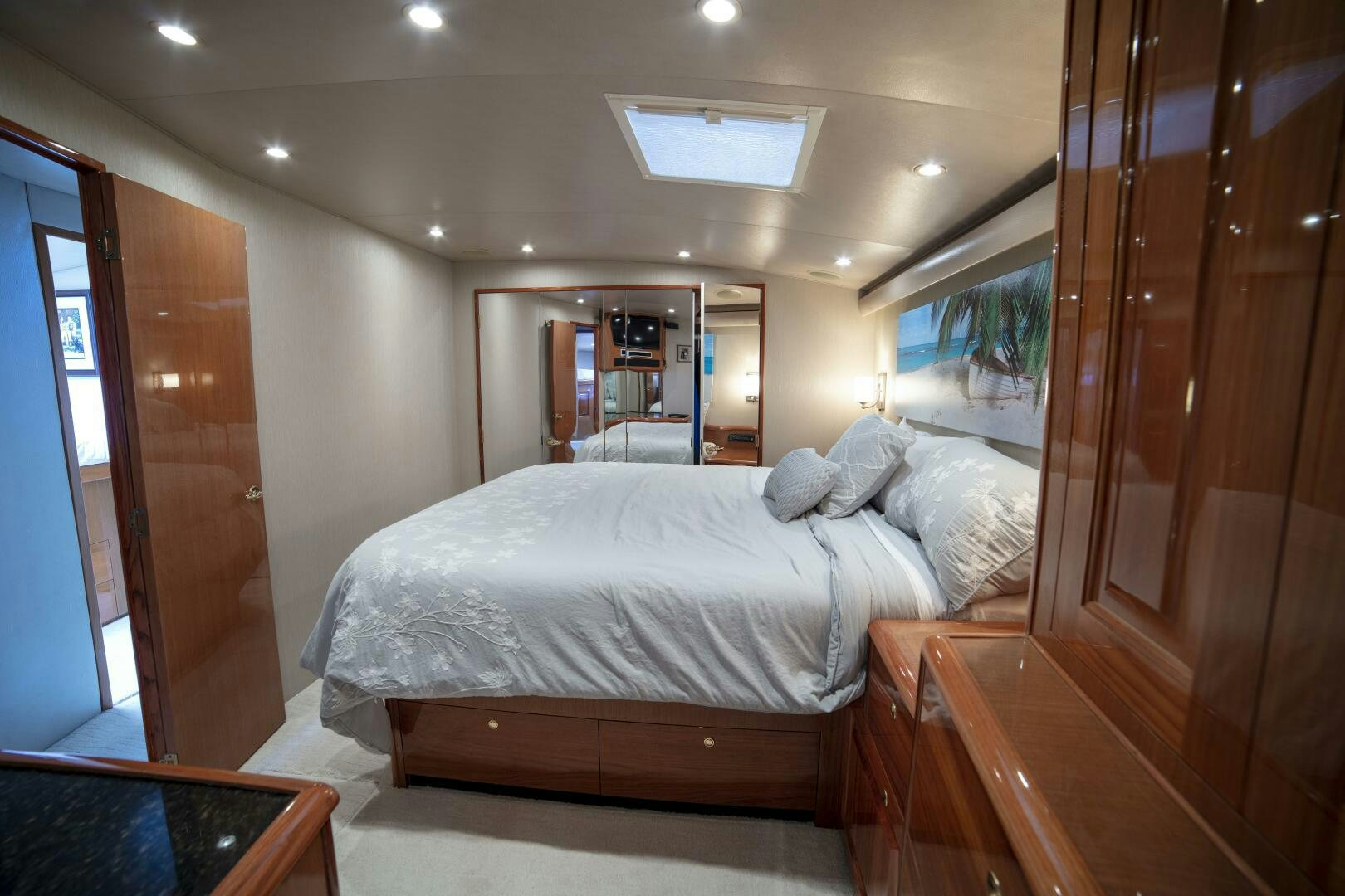 a bed in a room aboard PRIME TIME Yacht for Sale