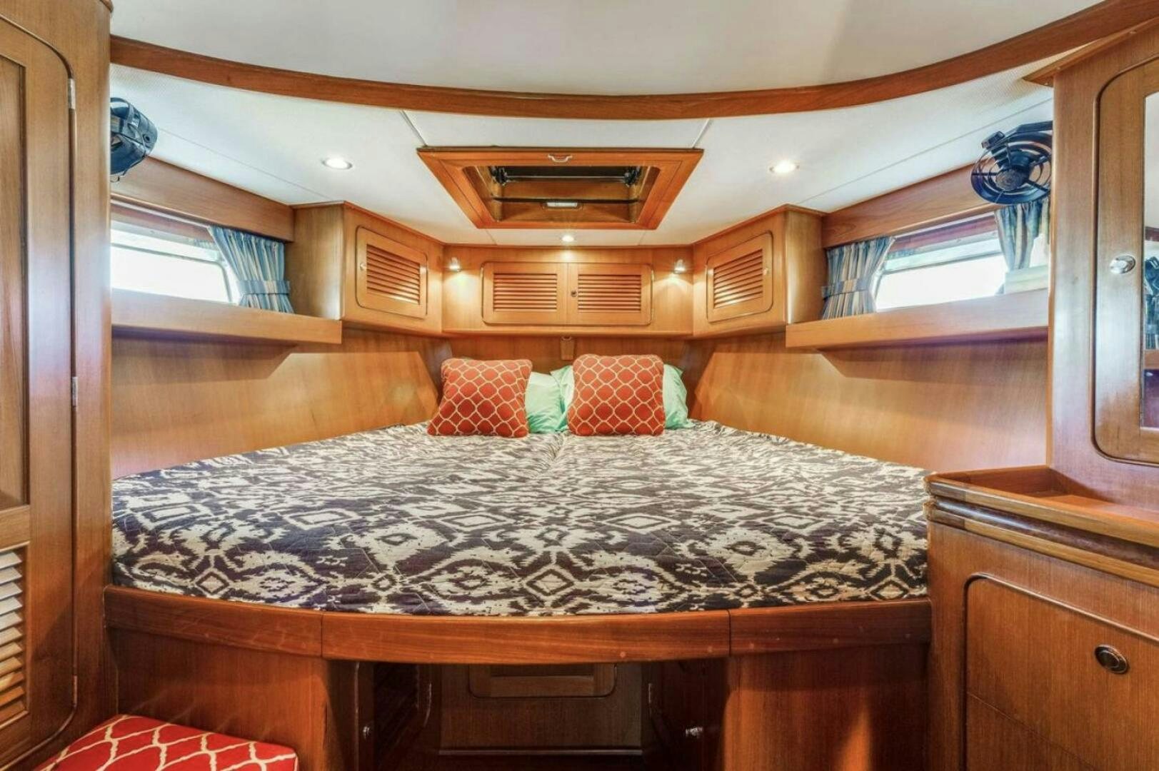 a bed in a cabin aboard PERFECT SYMMETRY 5 Yacht for Sale