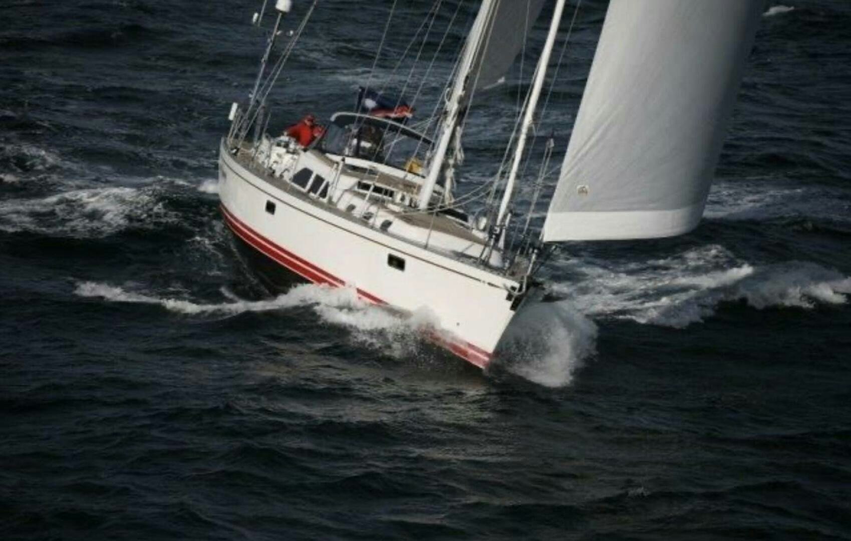 a boat on the water aboard PERFECT SYMMETRY 5 Yacht for Sale