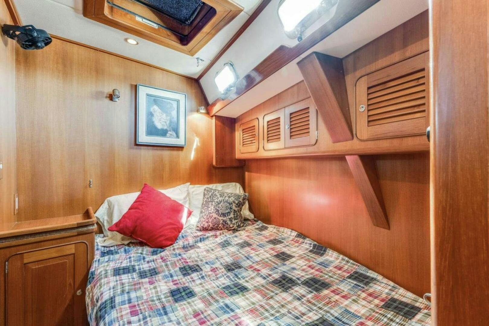 a bed in a cabin aboard PERFECT SYMMETRY 5 Yacht for Sale