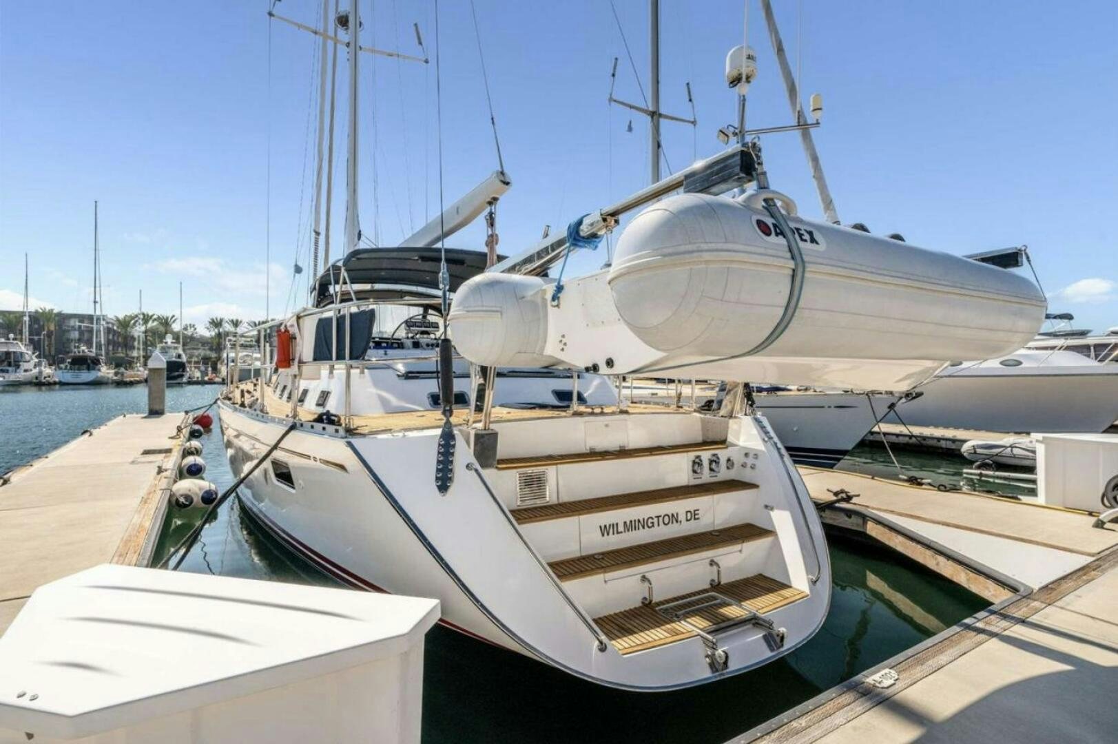 a boat docked at a pier aboard PERFECT SYMMETRY 5 Yacht for Sale