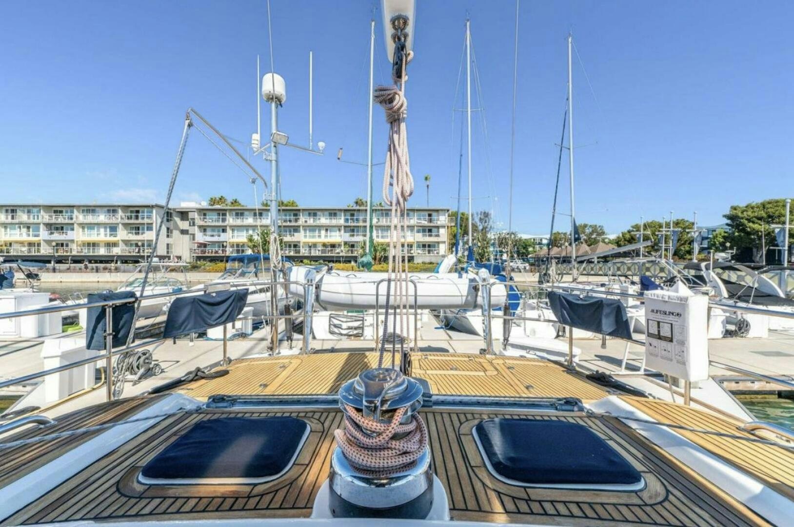 a marina with many boats aboard PERFECT SYMMETRY 5 Yacht for Sale
