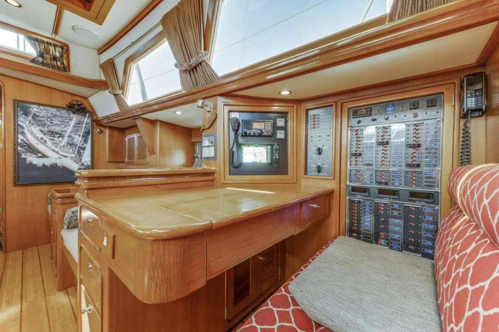 a room with a table and couch aboard PERFECT SYMMETRY 5 Yacht for Sale
