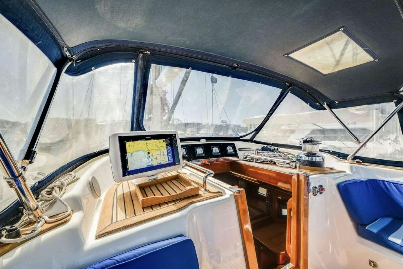 a vehicle with a laptop on the dashboard aboard PERFECT SYMMETRY 5 Yacht for Sale