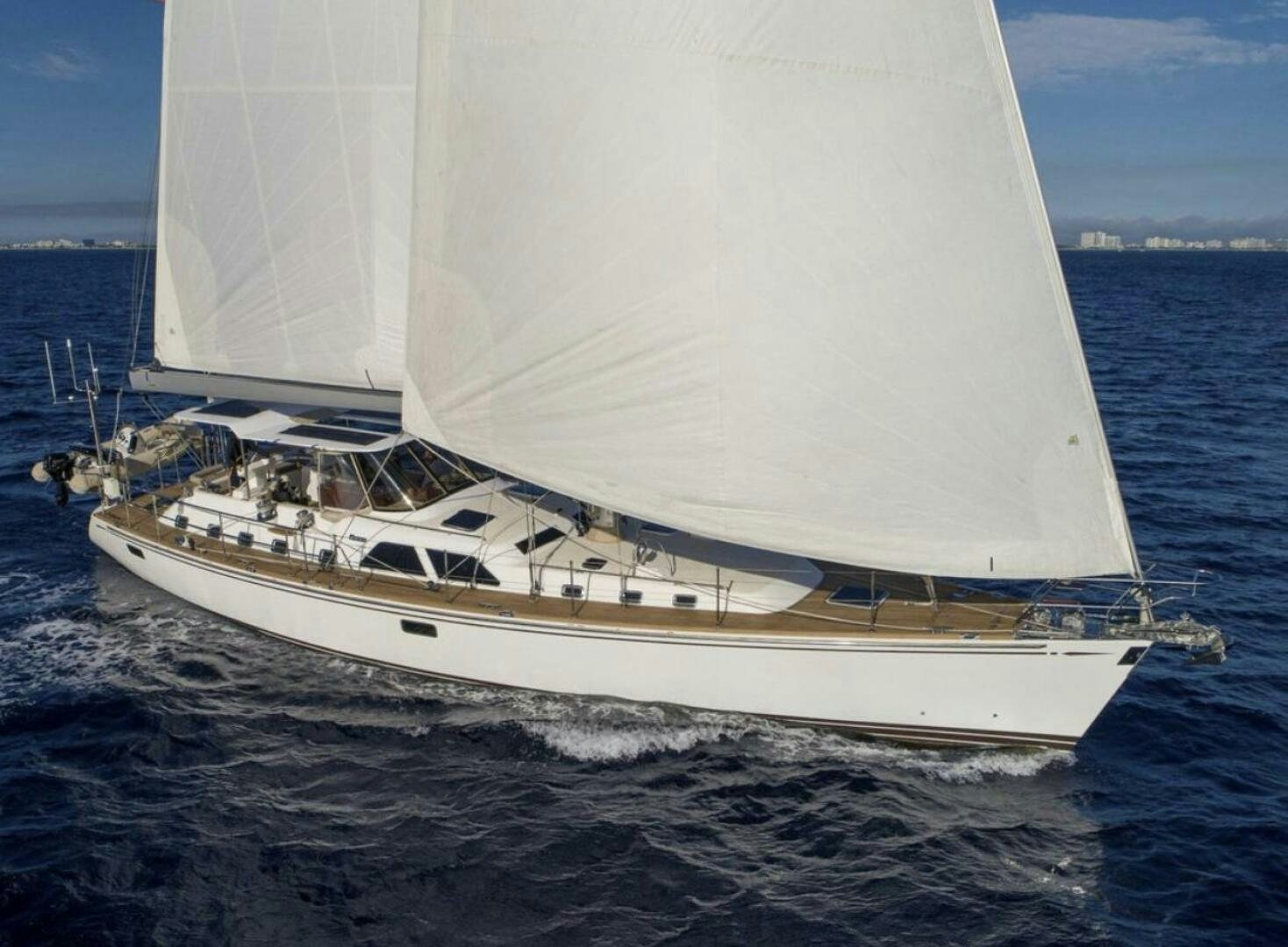 a white boat on the water aboard RAGNAR Yacht for Sale
