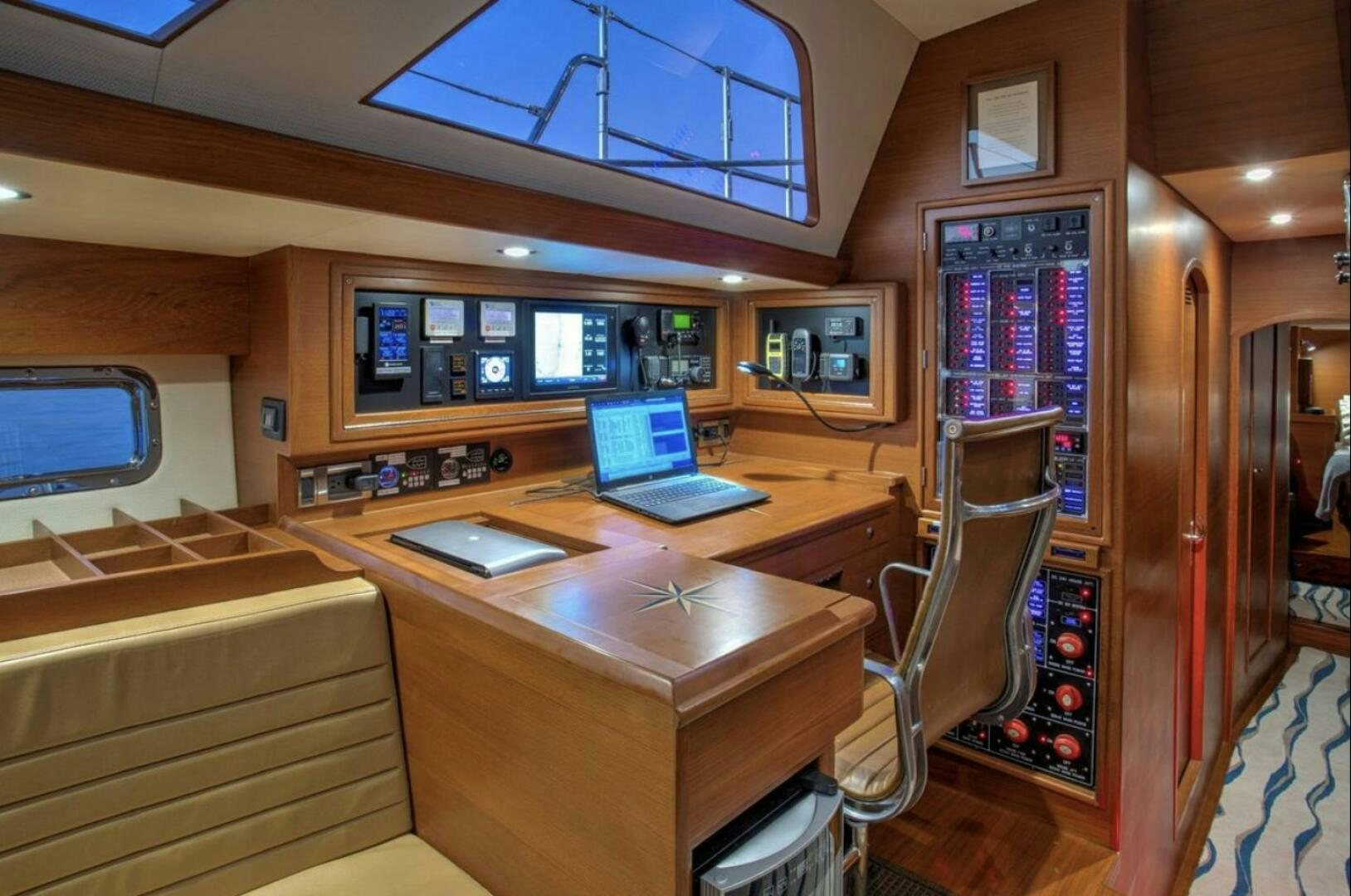 a room with a desk and laptop aboard RAGNAR Yacht for Sale