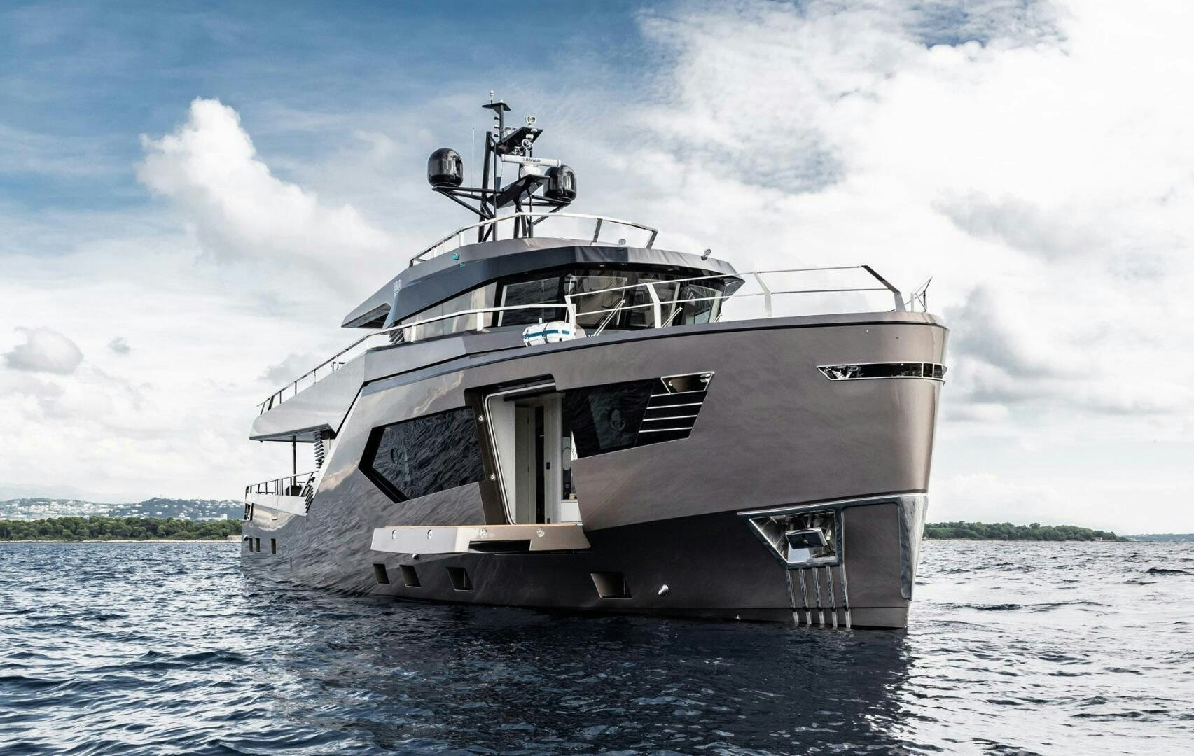 a large boat in the water aboard BEACH CLUB Yacht for Sale