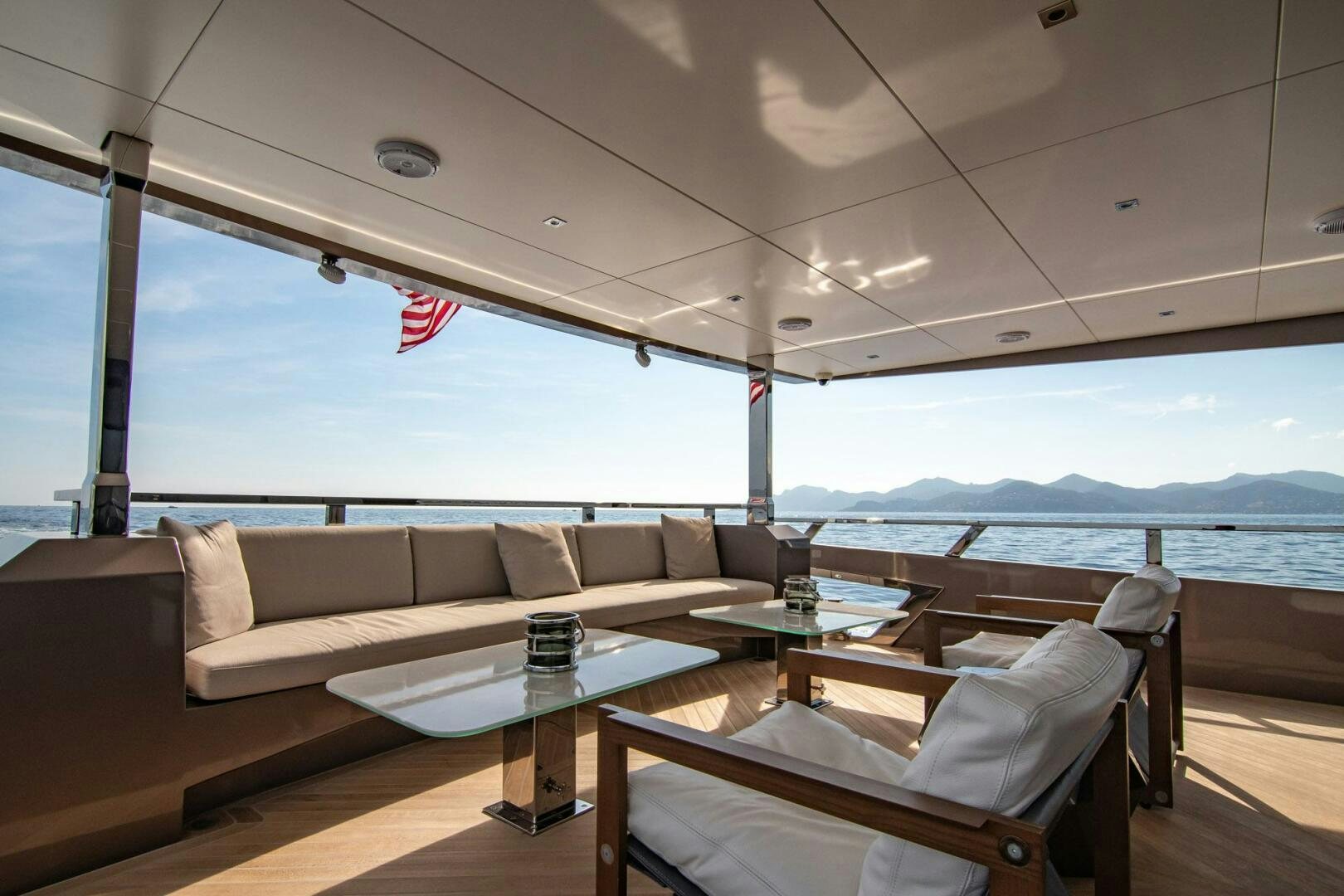 a living room with a couch and a table aboard BEACH CLUB Yacht for Sale