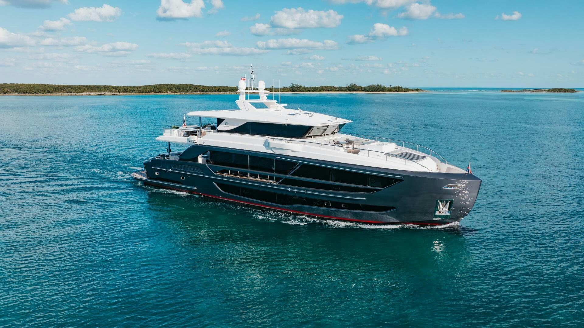 a boat in the water aboard UNTETHERED Yacht for Sale