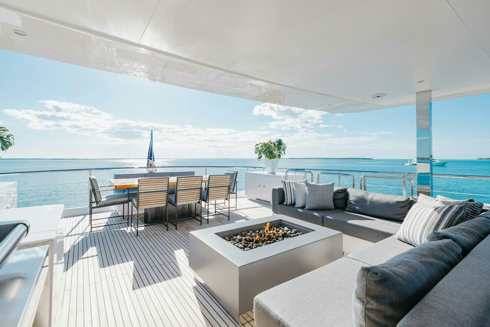 a living room with a large body of water aboard UNTETHERED Yacht for Sale